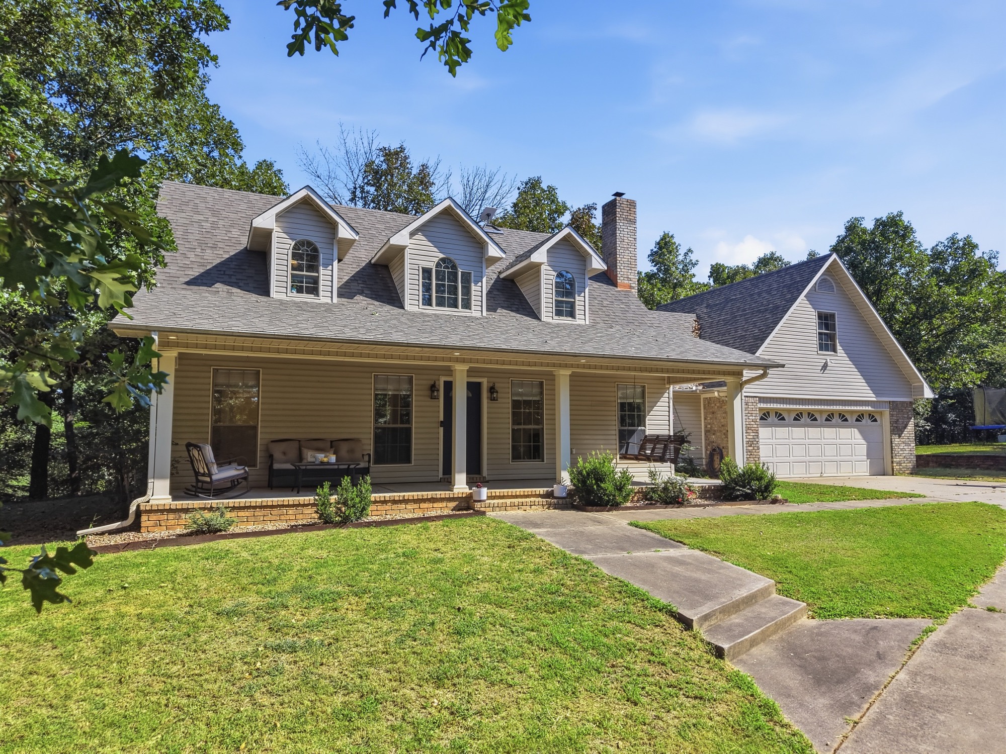 Front porch listing photograph of a Central Arkansas home